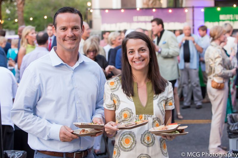 Guests happily fill up on small plates from the participating chefs.