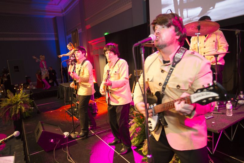 Debonaire Entertainment stole the show as a Beatles cover band.