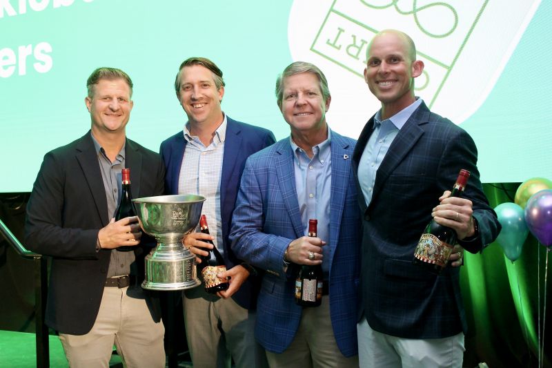 Tournament winners Nick Tanana, Zach McLaren, Ed Kercher, and Hagood Morrison II posed for a photo after a showdown at the Wild Dunes Links Course.