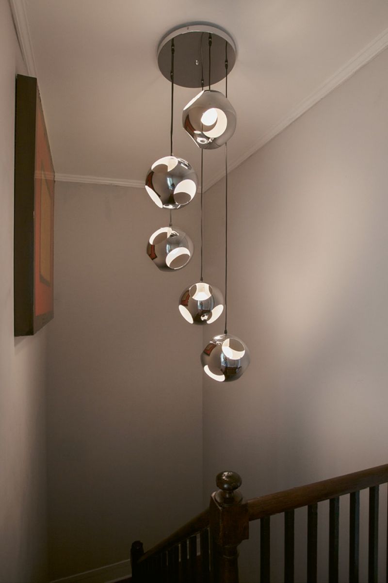 Naylor found the chandelier that illuminates the stairwell on eBay.