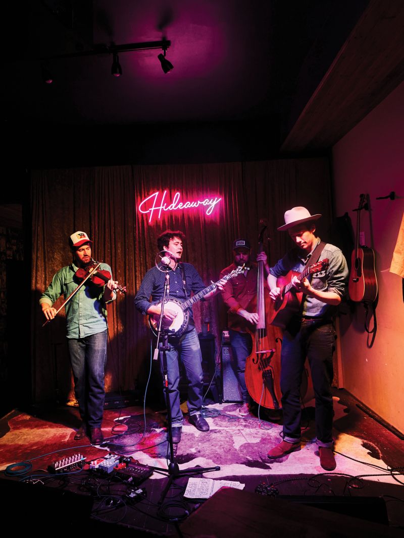 Live music at Jane’s Hideaway with Oliver Bates Craven and friends; here, Frank Evans sings.