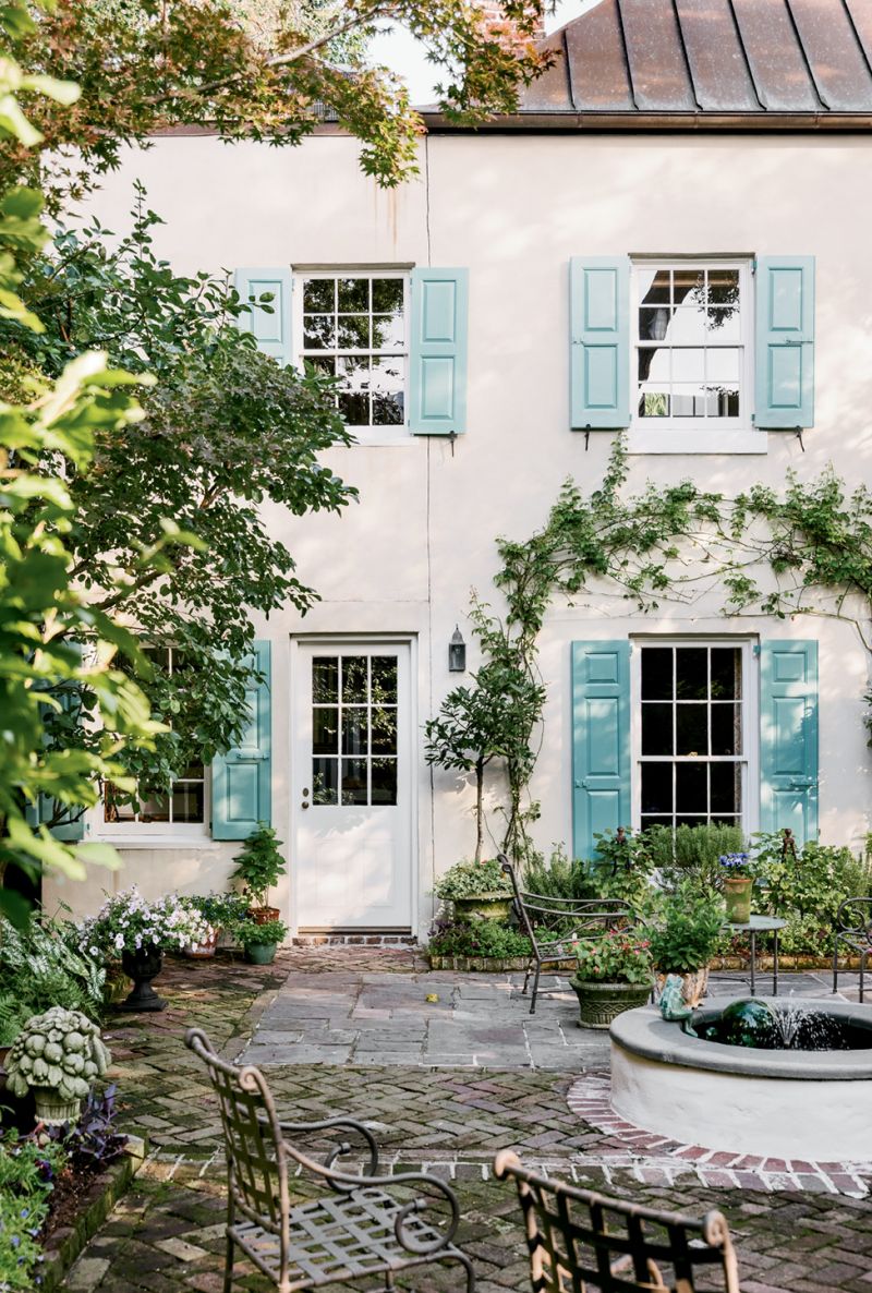 A bay leaf tree topiary just outside the kitchen-house door