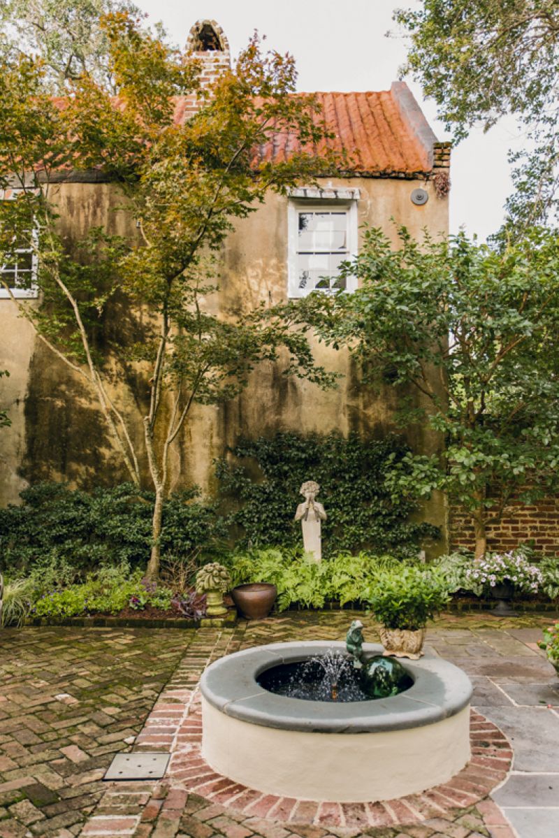 A previous owner filled in this fountain, which anchors the rear courtyard. Monica had it restored and rebuilt, returning the space’s signature water feature.