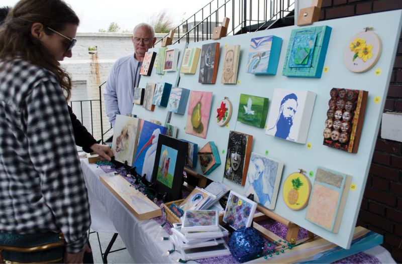 Guests perused a variety of locally made art.