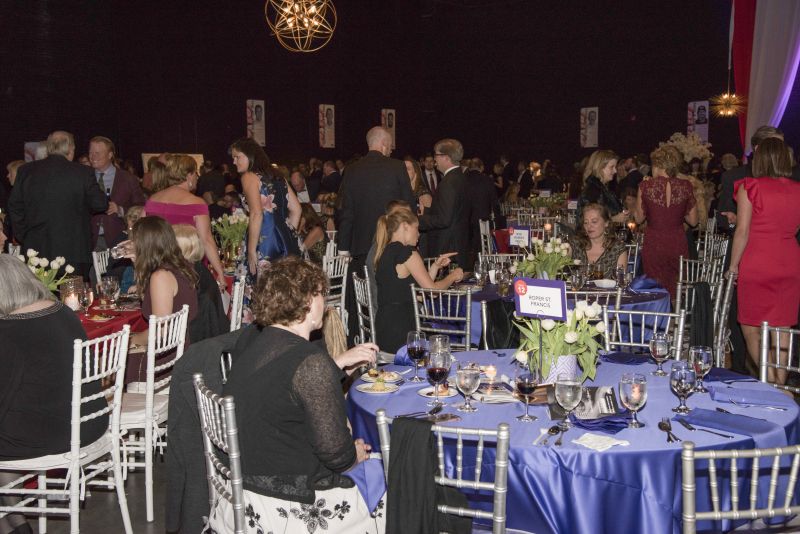 Guests mingled between small plates.