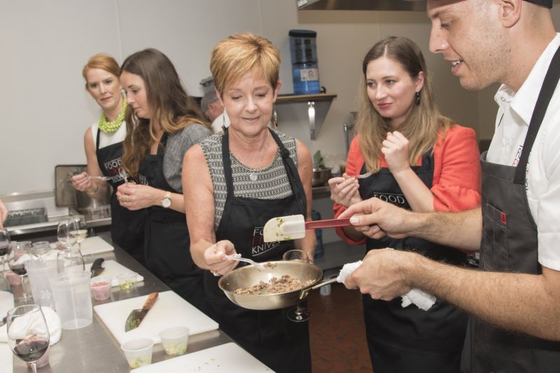 Gerri Greenwood tries the pork for the Asian pork lettuce wraps.