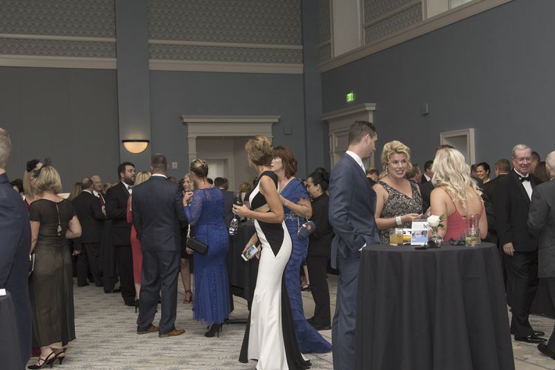 Guests mingled and enjoyed cocktails provided by the Cocktail Bandits before dinner.