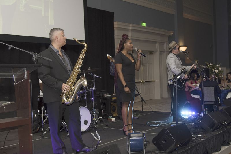 The Emerald Empire provided music before and after the live auction.