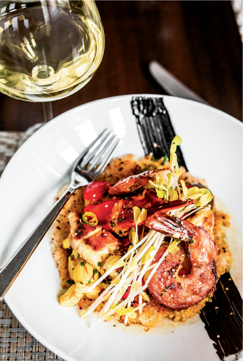 Chandeliers add drama to the dining room