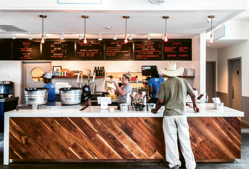 A retro letter-board menu greets customers.