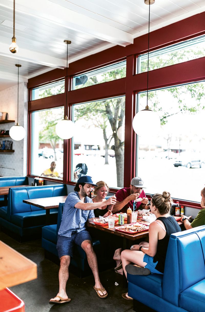 Blue booths uphold a nostalgic vibe.