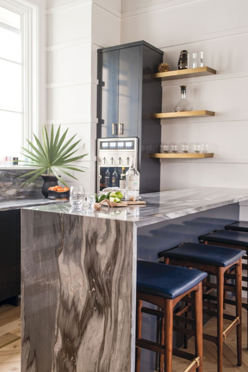 Beverages are at the ready in the adjacent poolroom and its bar with a self-serve wine dispenser.