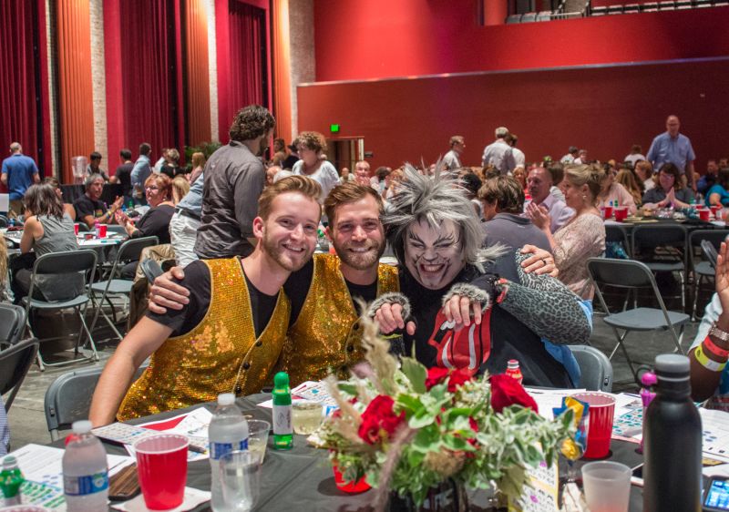 Mike Morris, Tim Brown, and Patrick Mitchell, dressed as a character from Cats