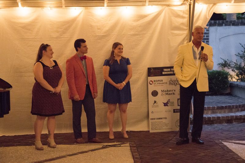 Former NFL player Jim Stuckey addresses guests.