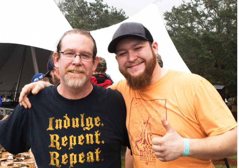 Father and son Tres and Cat Hundertmark were crowned winner and runner up of the oyster-shucking contest.