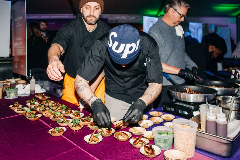 Nick McBride and David Lopez of Anson prepare barbecue quail from Manchester Farms
