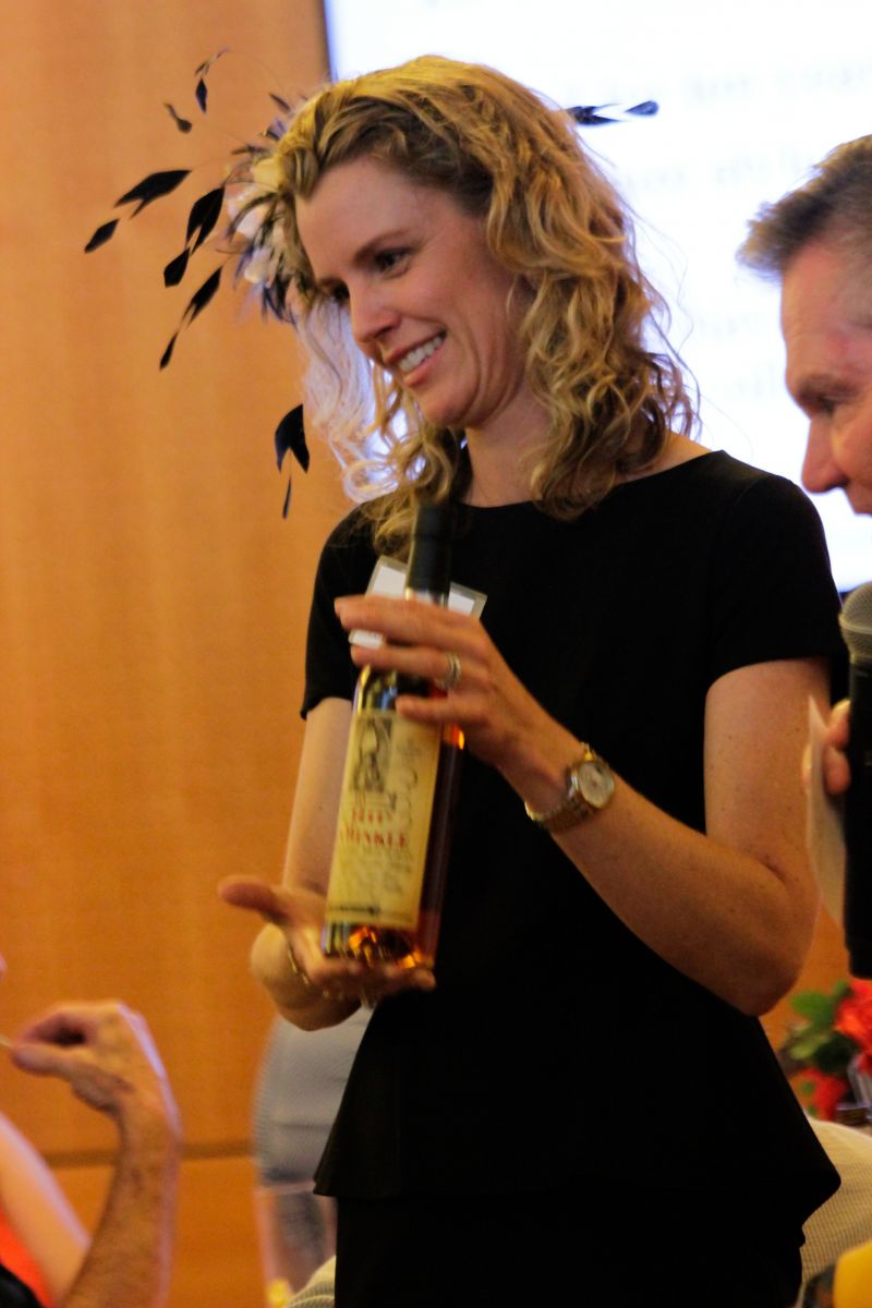 One of the auction&#039;s most exciting items, a rare bottle of Pappy Van Winkle, is awarded.
