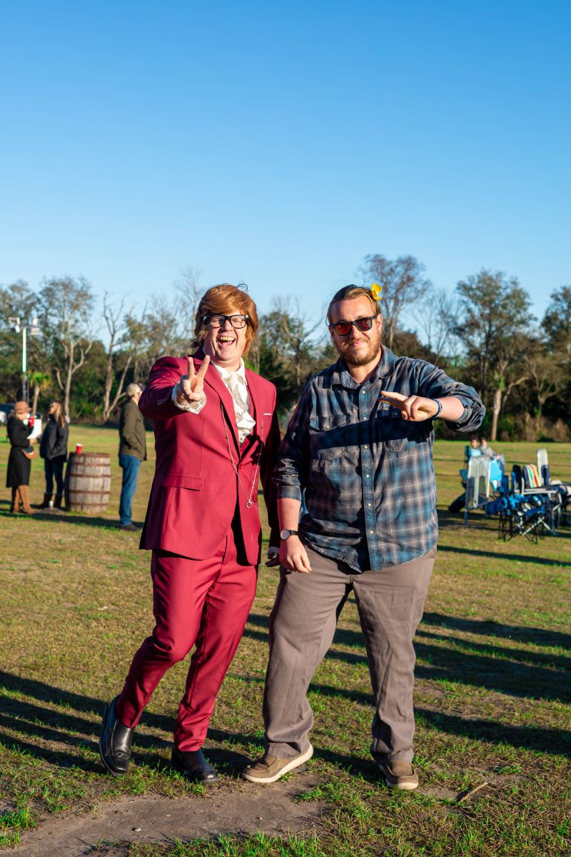 Costumed local realtor Jim Brantley embraced his inner Austin Powers, posing with Finnegan Culotta.