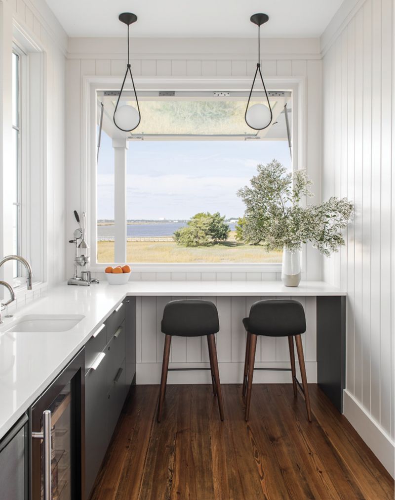 This is also Brad’s office, where he perches on a Bacco barstool under Corda pendant lights from Fritz Porter to take in the view while he works.
