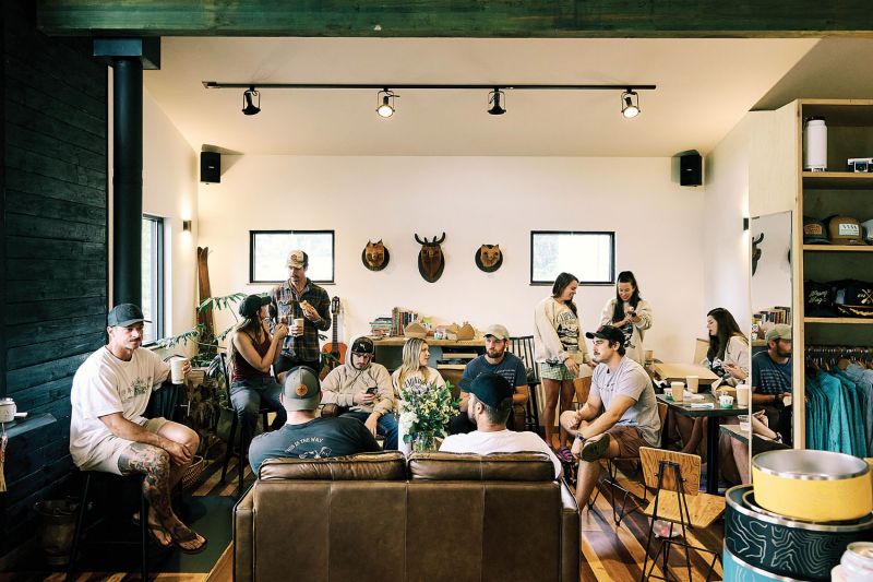 Guests gather for morning coffee in the canteen at Wrong Way River Lodge &amp; Cabins.