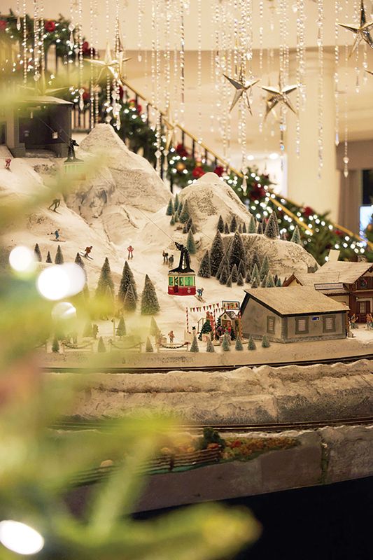 Nightly “snowfalls,” the holiday train, and posting letters to Santa have become beloved traditions for many local families at The Charleston Place.