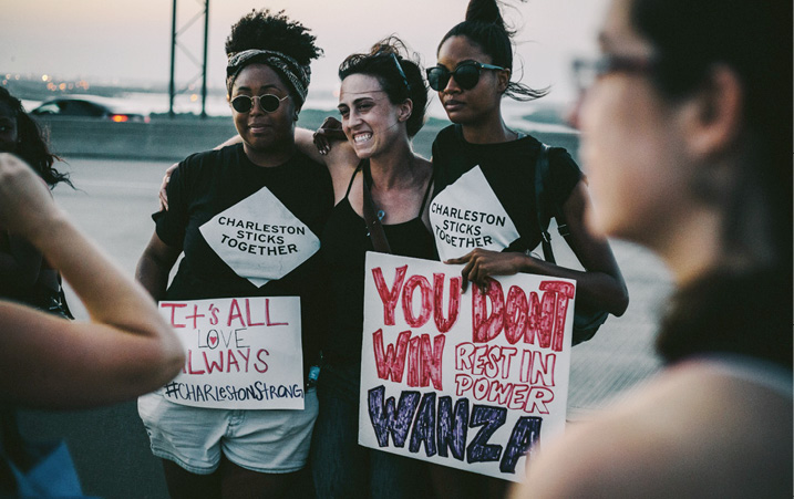 Bridge to Peace: What began as an impromptu Facebook event, hoping to draw maybe 1,000 people, turned into a bridge-spanning love fest on the Sunday after the shootings. Photograph by Floyd Smalls Jr.